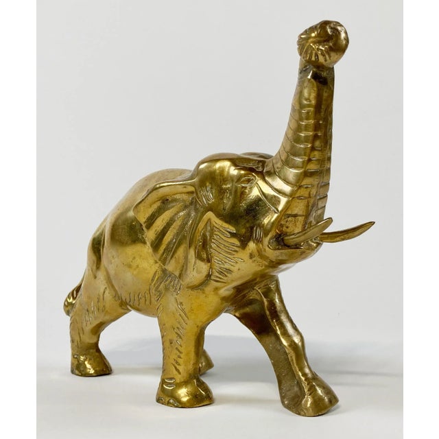 Amazing size and detail to this vintage solid brass elephant. Trunks up! (A symbol of luck and good fortune....if you like...
