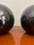 Beautiful pair of gloss black post modern vases. In great vintage condition. Simple shape with a striking bold finish. The...