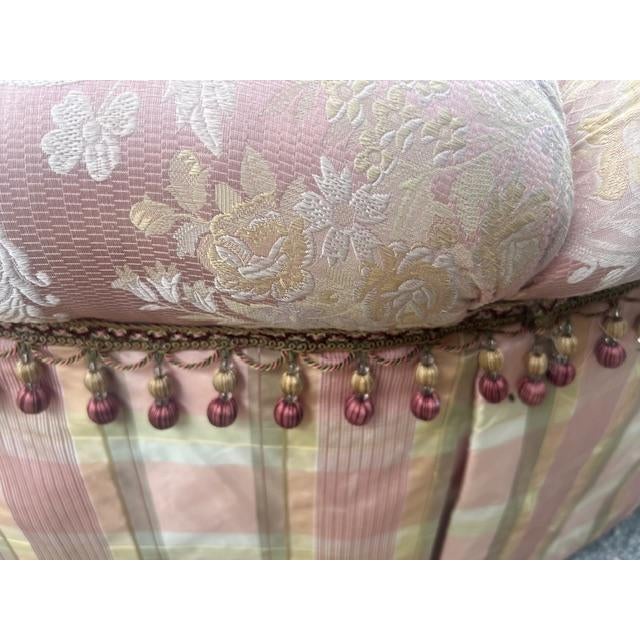 This custom-made large oval tufted ottoman is a stylish and versatile addition to any living room. With its original...