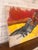 Offered is an original figurative painting depicting a reclining woman, rendered in a striking palette of crimson red,...