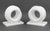 Pair of Modern Carved White Quartzite Sculptures, each in the form of a geometric circular spiral atop a white marble...