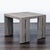This Restoration Hardware side table features a modern block design with a weathered teak wood finish. Its clean lines and...