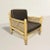 A rustic and chic early 20th century American hickory framed armchair with woven sides and back, and a creamy ivory...