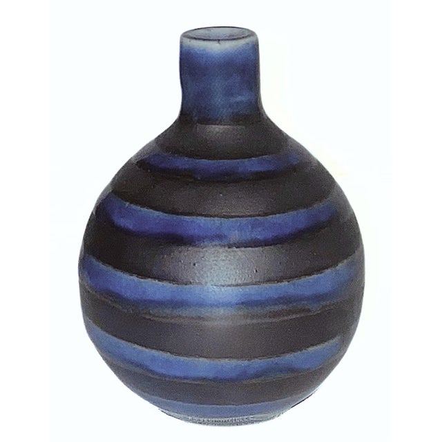 Add a striking touch of mid-century modern style to your shelving display with this rare vintage Otagiri Mercantile...
