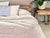 Infuse a soft, delicate color into your décor with the Seacliff Pink collection by Modern Plum Home. Woven from premium...