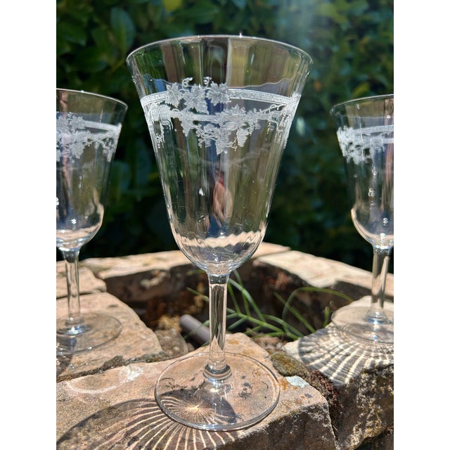 For your consideration are a set of three Fostoria Optical bowl wine glasses with a fine etched grapevine around the...