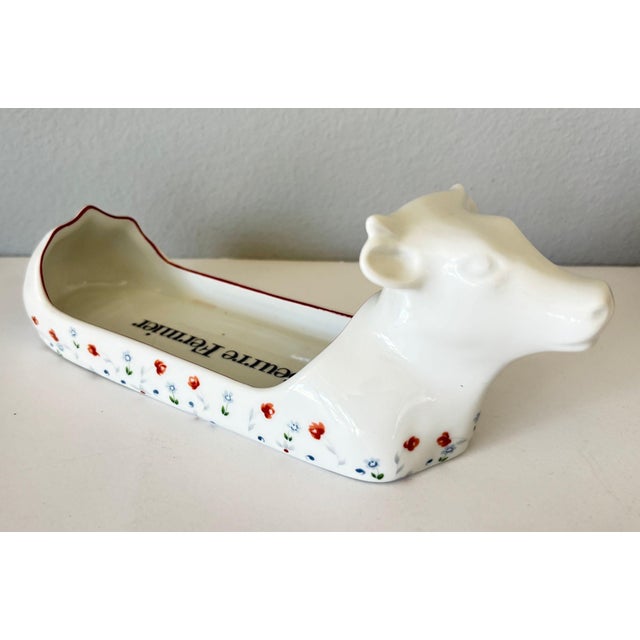 Apilco French Porcelain Cow-Form Butter Dish “Beurre Fermier,” circa 20th Century A charming vintage butter dish by...