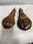 Two copper powder flasks from the 19th century. One is signed American Flask and Cap Co. The other has no signature but is...