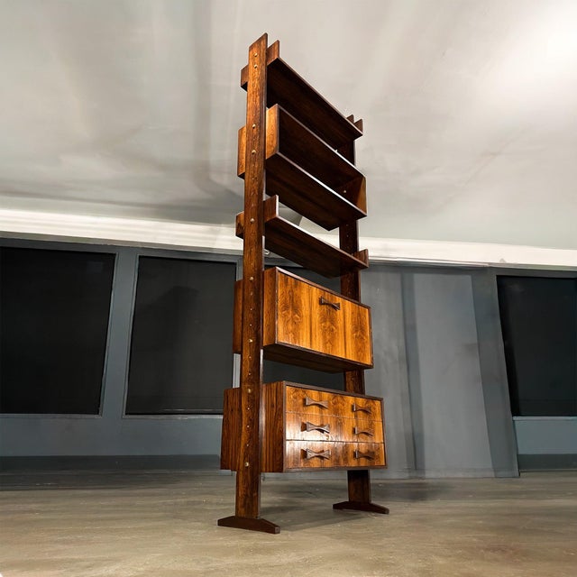 Designed in Brazil in the 1960s, this modular bookshelf by Ernesto Hauner exemplifies the disciplined elegance and...