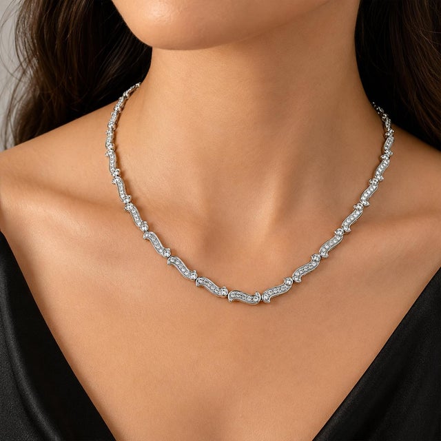 18k White gold necklace with 184 round brilliant diamonds weighing 7.82 carats. 33.49 grams