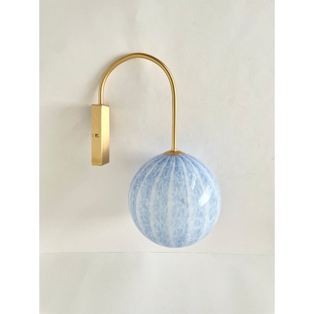 Tulipano by la murrina is a splendid vintage wall lamp from the 1990s, featuring beautiful murano glass. Its spherical...