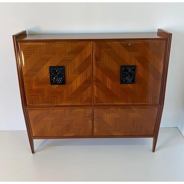 Elegant Italian secretaire produced in the 1950s, distinguished by its refined architectural form and exceptional...