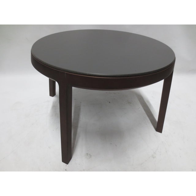 The Aro collection re-imagines round typology with the Aro Pedestal Table, featuring a solid beech wood base and wooden...