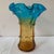 Striking Murano Hand Blown Art Glass Vase with distinctive dual tone color scheme that transitions from a rich amber base...