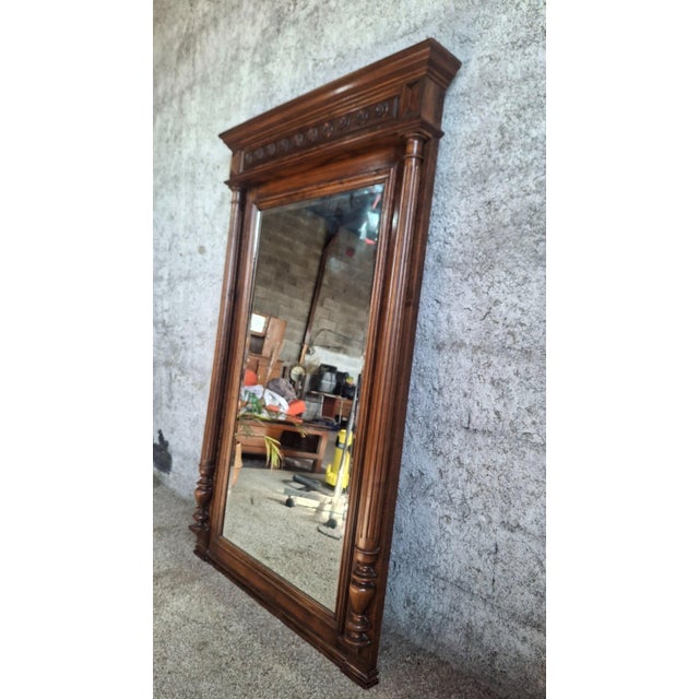 Large carved solid wood trumeau mirror, likely walnut and oak, dating from the second half of the 19th century. The frame...
