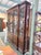 An exceptional Kindel Winterthur breakfront cabinet exhibiting the distinguished craftsmanship and classical architectural...