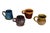 A set of four mismatched earthenware mugs with colorful drip glazes. One is a triangular shaped mug in a blue with green...