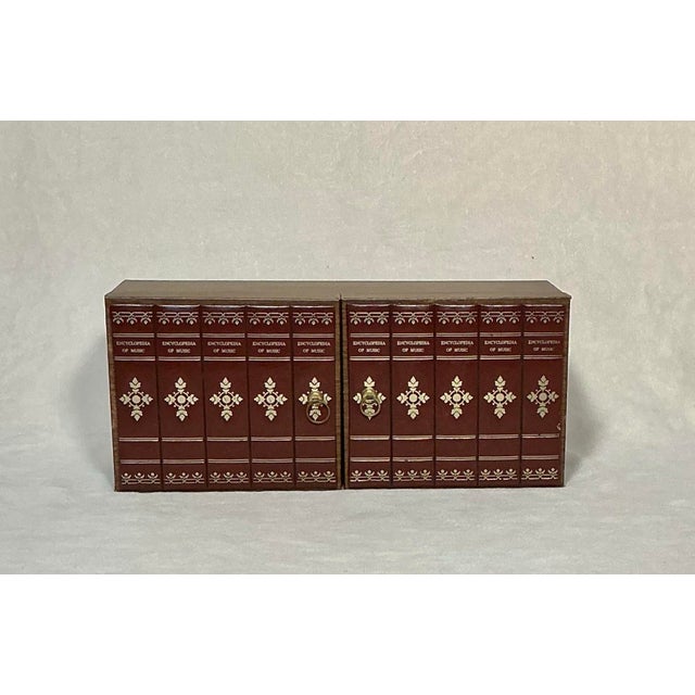 1970's vintage Mid-Century faux-wood combined with faux-leather book facade of "Encyclopedia of Music" books for...