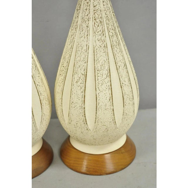 Vintage Mid Century Modern Sculpted White Ceramic & Teak Wood Table Lamps - Pair For Sale - Image 4 of 12