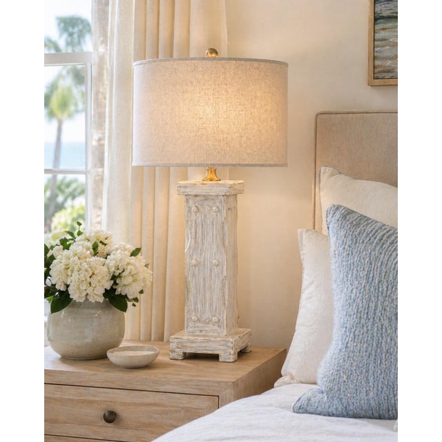 Bring a refined, sun-washed coastal presence into your space with this striking pair of sculptural column table lamps....