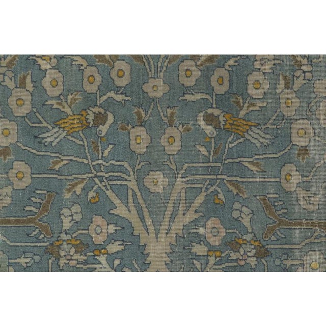 Hand-knotted in wool circa 1910-1920, this oversized 11x14 Indo-Persian rug from India joins Rug & Kilim’s extensive...