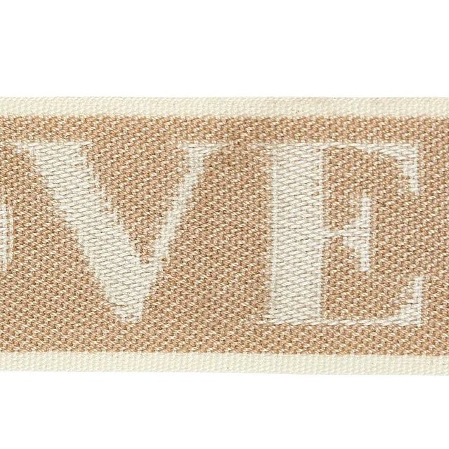 A reinterpretation of a document from the Schumacher archives, the word LOVE is woven in repeat across the cotton/linen...
