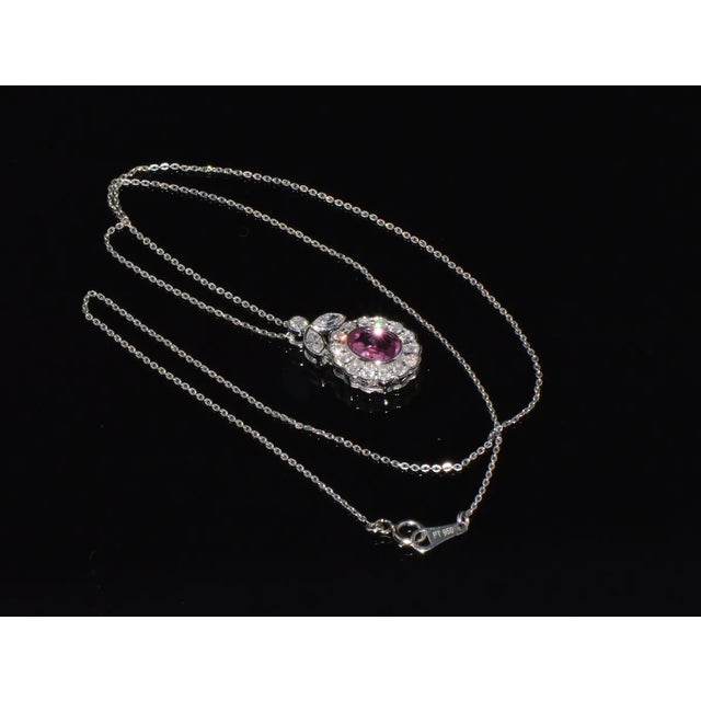 Gorgeous 18K solid gold / 950 platinum GIA certified 2.35CTS diamond and sapphire necklace. The pendant has a very fine...