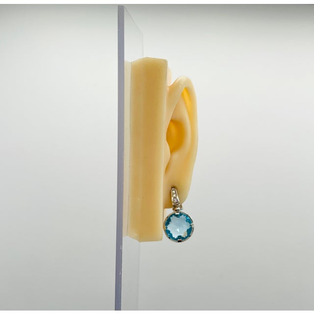 Beautiful estate Bulgari blue topaz Serpenti dangle earrings with white diamond rounds. Handmade in 18k white gold.