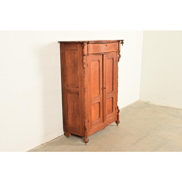 R. J. Horner & Co. Antique Victorian Carved Oak Wardrobe or Armoire Dresser, Circa 1890s For Sale - Image 4 of 17