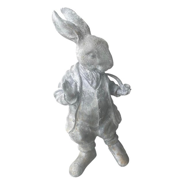 A charming and beautifully detailed vintage cast iron garden statue depicting an anthropomorphic "Dapper Rabbit" or White...