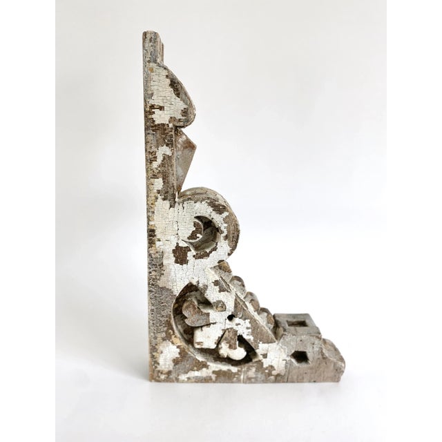 This distressed architectural fragment is a sculptural example of a Victorian corbel with age and patina.