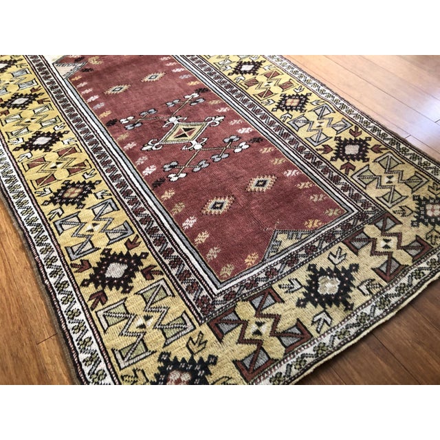 Each vintage rug is truly one of a kind, and this Milas piece is a beautiful example of that individuality. Handwoven in...