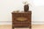 Chart a course for distinctive style with this captivating vintage teak and brass trunk, a piece that whispers tales of...