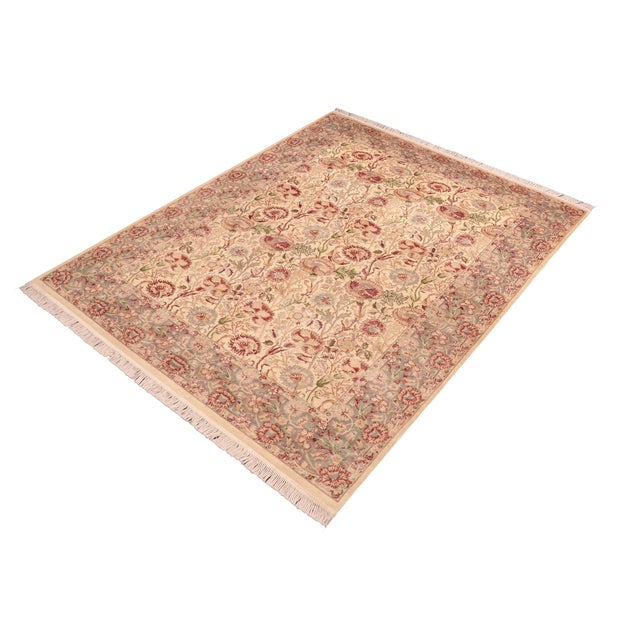 Designed with mesmerizing intricacy and gorgeous color palette, this hand-knotted masterpiece demonstrates the beauty and...
