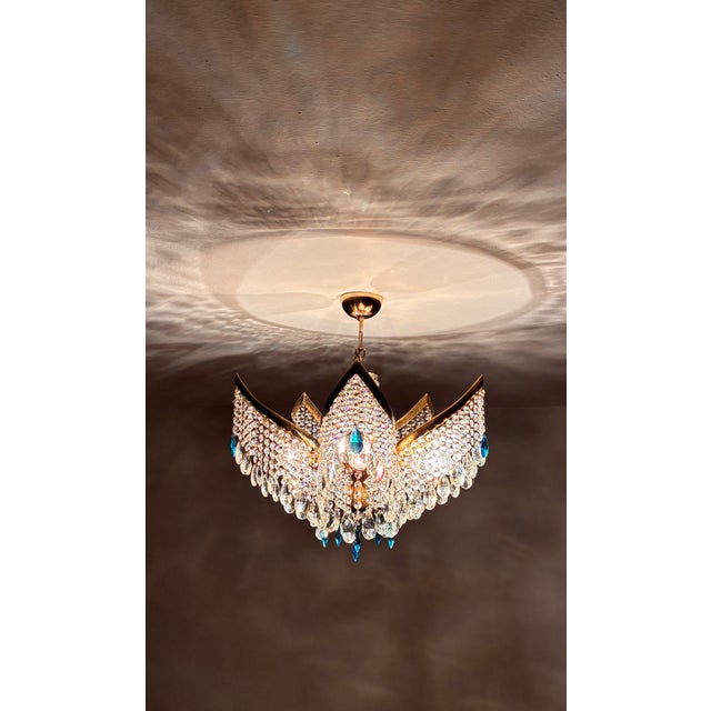 Rare 1960s Vintage 5-Light Brass & Aqua Blue Crystal Chandelier – Leaf Form Add a breathtaking touch of 1960s elegance to...