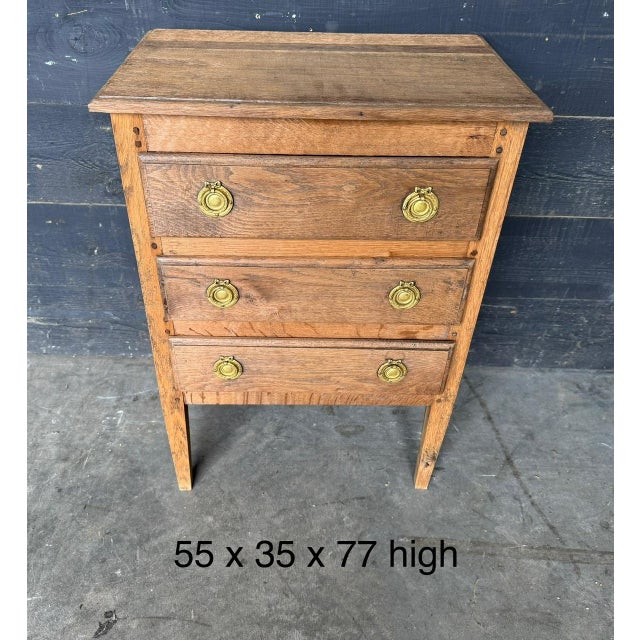 A cute small sized early 19th Century French Oak Chest of Drawers. The 3 drawers slide smoothly and we have bleached it...