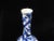 Pear-shaped porcelain vase decorated with stylized bats from the late Ming (1580-1644)/early Qing dynasty. The shape is...