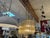 Design Plus Gallery presents an Orchard Midcentury Brass Chandelier from Ethan Allen. The chandelier has an antique brass...