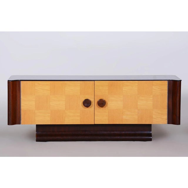 Designed by Jindrich Halabala, a renowned designer credited with ushering in the mass market production of furniture in...