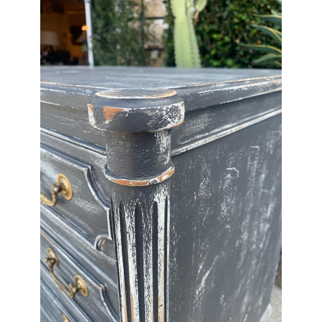 Pair of vintage solid wood chests/nightstands with a newly applied distressed painted finish and original hardware. Each...
