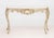 Italian Rococo Style Silvered Wood Console Table, with white stone top, the base ornately carved with shell rocaille...