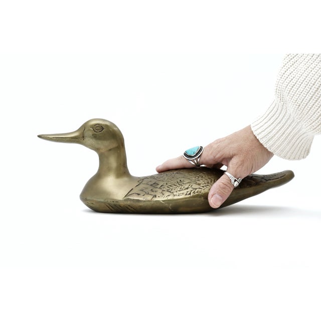 Large Vintage Brass Duck Decoy Figurine. This listing is for a vintage large brass duck. Place this charming bird in any...