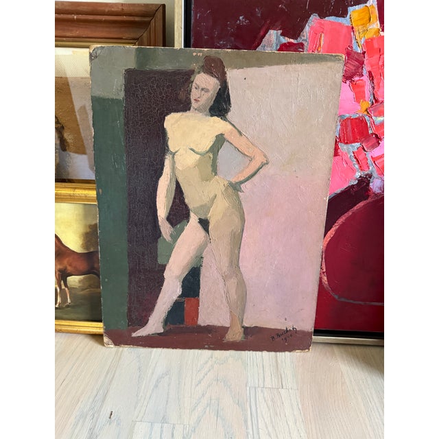 Purchased in France, this oil painting depicts a nude woman rendered in soft, muted flesh tones—pale beiges, pinks, and...
