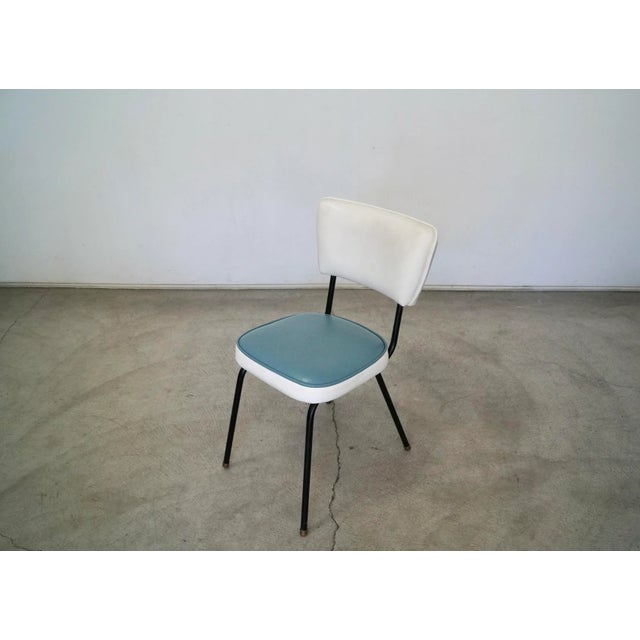 We have this lovely vintage 1950's dining chair for sale. It was professionally reupholstered in leather a few years ago,...