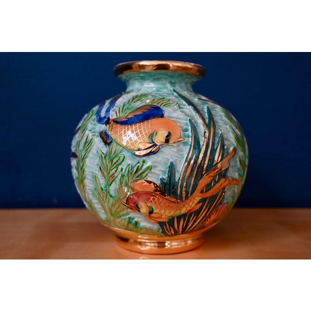 A classic spherical shape, exceptional colors and textures bordering on kitsch! This large vase, signed Lamarche Monaco,...
