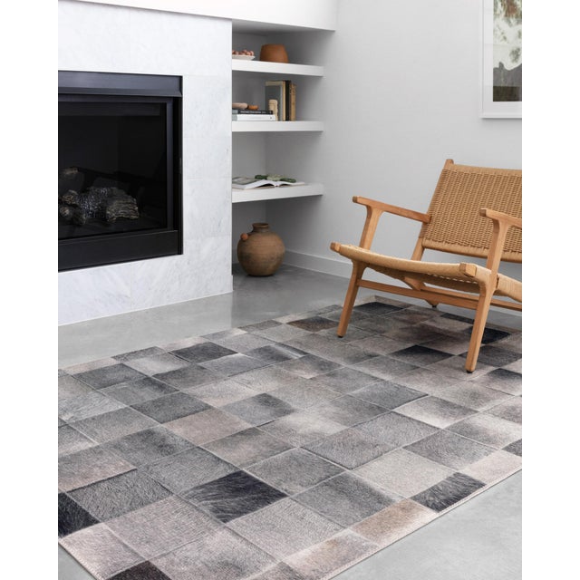Modern and sophisticated, the Maddox Collection offers cowhide patchwork looks at an affordable price. Power-loomed in...