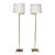 A timeless blend of form and function, this pair of modern adjustable floor lamps showcases sleek brass construction with...