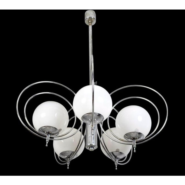 This stunning pair of 5 lights chandelier with rare handblown Murano glass balls and chrome metal fixture. Original tested...