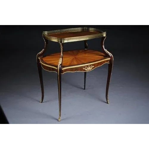 Unique French side table or étagère after F. Linke Body with fine veneer on solid beech wood. Daintily elaborated, body on...