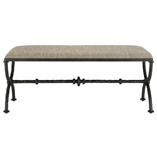 The curvaceous sides and the ornamented stretcher of the Agora Peppercorn Bench are made of iron in a rustic bronze...